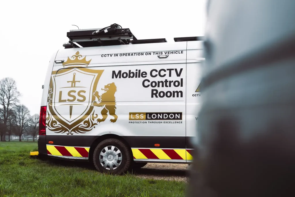 LSS London mobile CCTV control room van parked beside a grassy area.