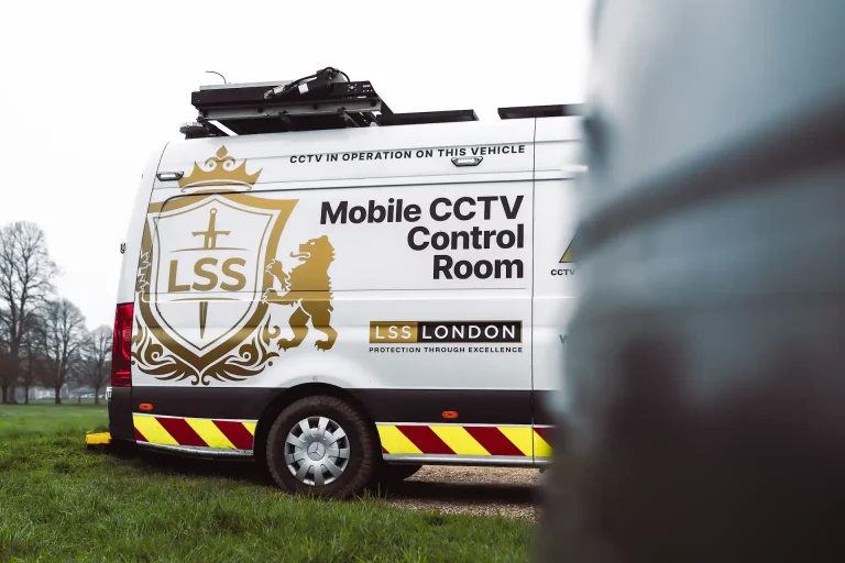 LSS London mobile CCTV control room van parked beside a grassy area.